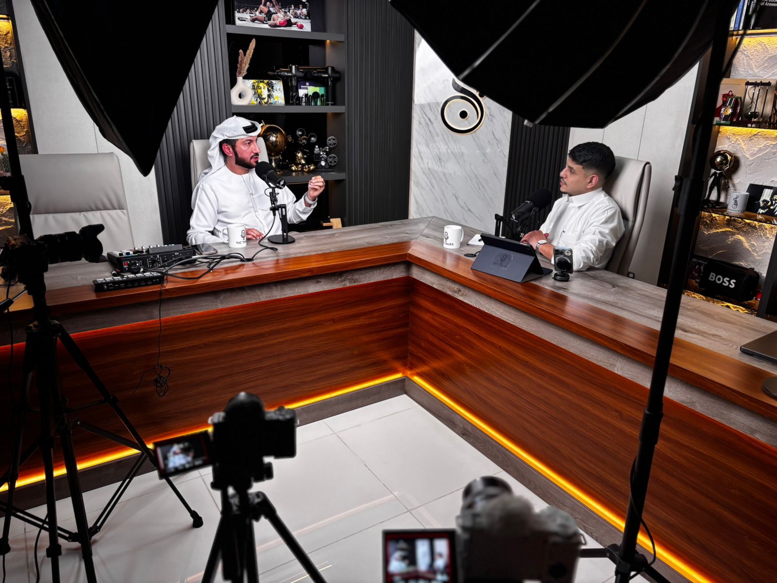 Wide behind-the-scenes podcast production setup
